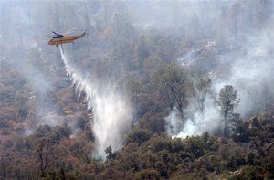 The Latest: Military planes mobilized to fight fires in West