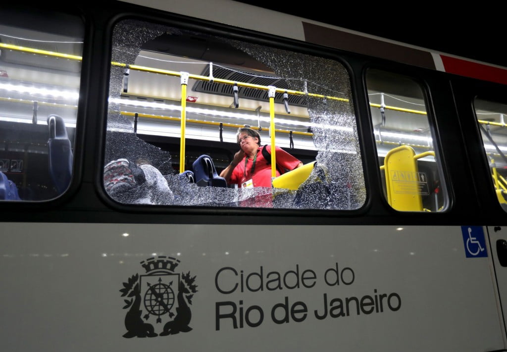 Gunfights in favelas and broken media bus windows: More violence erupts during Rio Olympics